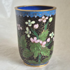 Vintage oriental black cloisonne style small pot decorated with pink and yellow flowers and green foliage - 7.5cm tall