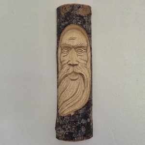 Decorative hand carved wooden wall hanging depicting a mans face - H28cm