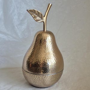Pear shaped polished gold coloured metal trinket box - 20cm tall