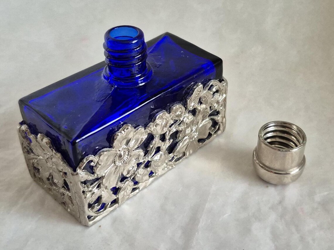 Vintage Rectangular Blue Glass Ornamental Perfume Bottle Encased in an ...