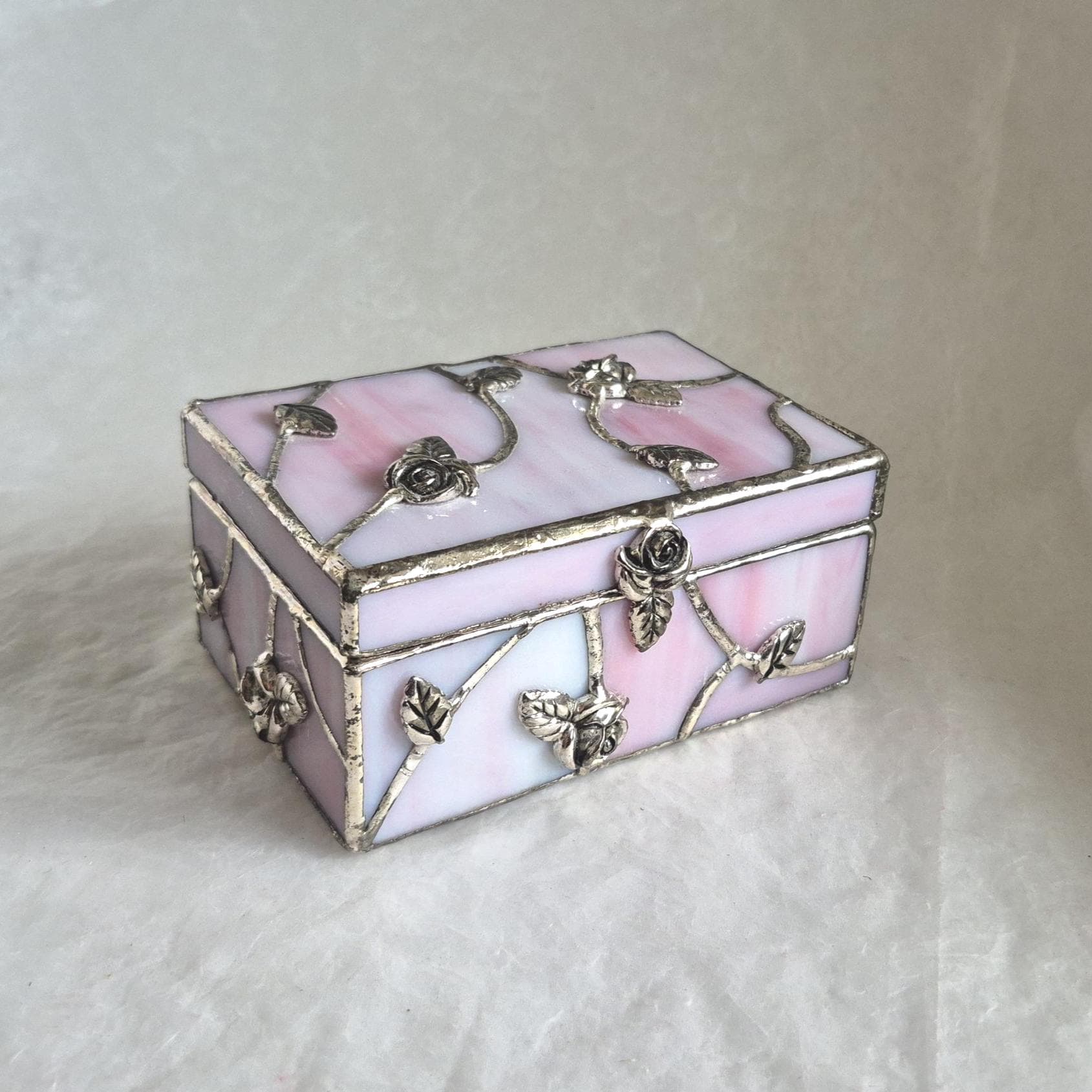Vintage Rennie Mackintosh style stained glass trinket/jewellery box - pink and white glass with rose and leaf metal decoration - 12.5cm wide