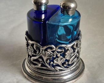 Vintage style pair of cobalt and aqua blue glass perfume bottles in a decorative silver metal filigree holder - Diameter 6.5cm