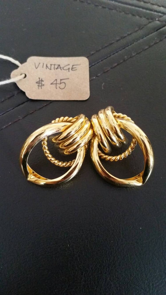 Vintage gold tone art deco pierced earrings.