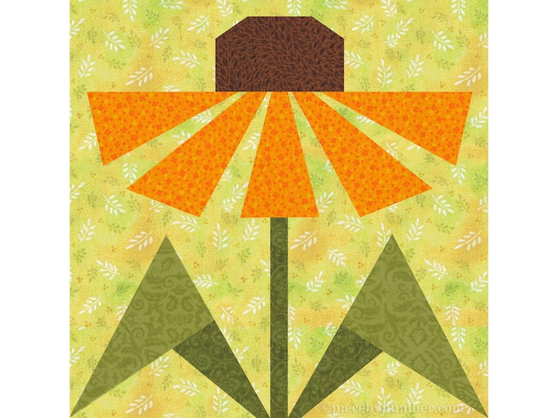 Black-eyed Susan, paper piecing flower quilt block pattern, PDF download, 6 & 12 inch, resizable, foundation piecing FPP.  The image shows one possible color scheme for the Black-Eyed Susan quilt block, with golden-orange petals, dark brown center and olive green leaves on a light yellow-green background.
