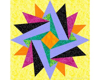 May include: A colorful patchwork quilt block featuring a star design with purple, green, orange, black, and pink fabric pieces. The background is a yellow fabric with a floral pattern.