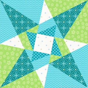 May include: A colorful patchwork quilt block with a star design. The block features a variety of green, blue, and white fabrics with different patterns, including floral, geometric, and chevron.