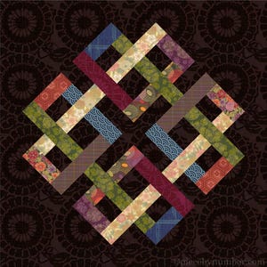 May include: A colorful quilt block with a geometric pattern of overlapping squares and rectangles. The block is made of various fabrics with floral, geometric, and abstract designs. The colors include red, green, blue, yellow, and brown.