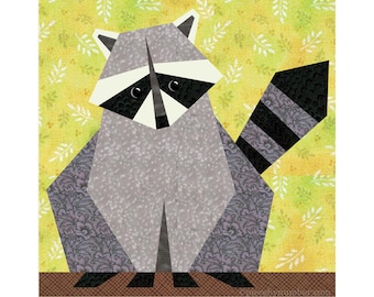 May include: A geometric patchwork design of a raccoon. The raccoon has a gray body, black and white facial markings, and a striped tail. The background is yellow with a leaf pattern. The raccoon is sitting on a brown surface.