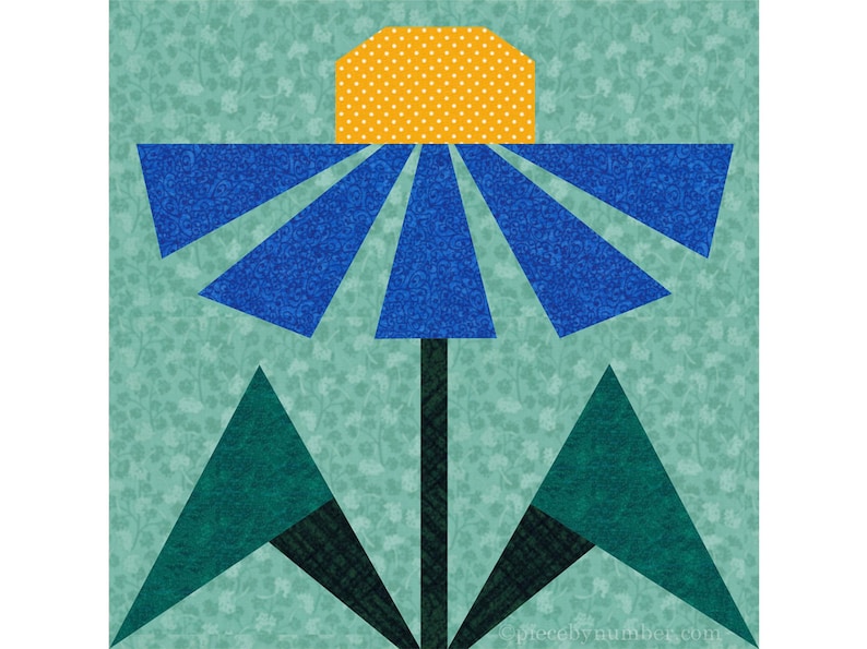 Black-eyed Susan, paper piecing flower quilt block pattern, PDF download, 6 & 12 inch, resizable, foundation piecing FPP.  The image shows one possible color scheme for the Black-Eyed Susan quilt block, with blue petals, golden-yellow center and dark green leaves on a medium green background.