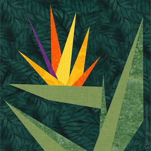 May include: A close-up of a bird of paradise flower made from fabric. The flower is yellow, orange, and purple and is set against a dark green background.