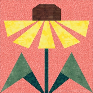 Black-eyed Susan, paper piecing flower quilt block pattern, PDF download, 6 & 12 inch, resizable, foundation piecing FPP.  The image shows one possible color scheme for the Black-Eyed Susan quilt block with yellow petals, brown center, and dark green leaves on an orange-pink background.