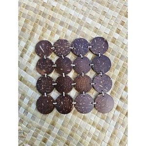 May include: A rustic wooden sign with the text "Welcome to our home" in white lettering. The sign features a distressed finish and a simple, inviting design, perfect for a front porch or entryway.