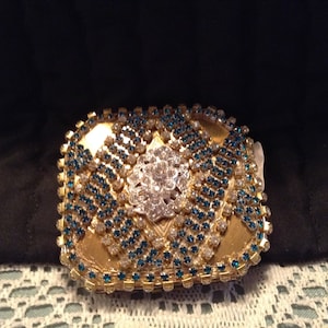 Jeweled compact with powder compartment
