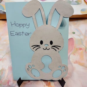Osterkarten geeignet für Kind zu geben oder zu empfangen. Pink oder blau wählbar. "Hopfenreiche Ostern" auf der Vorderseite. Die Karte misst 14 x 10 cm