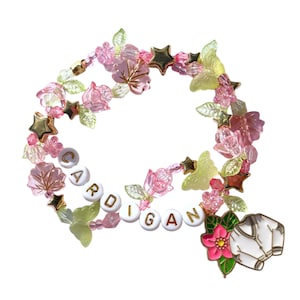 stretchy friendship bracelet • “cardigan” • charm bracelet