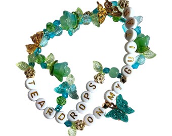 stretchy friendship bracelet • “teardrops on my guitar” • charm bracelet