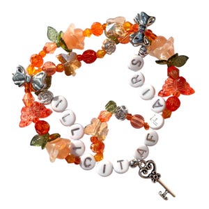 stretchy friendship bracelet • “illicit affairs” • charm bracelet