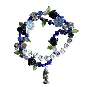 stretchy friendship bracelet • “mastermind” • charm bracelet