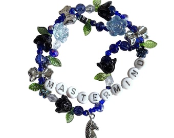 stretchy friendship bracelet • “mastermind” • charm bracelet