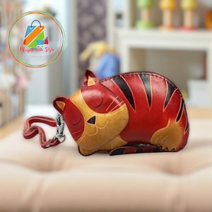 Monedero de piel auténtica hecho a mano con forma de animal: Minicartera de diseño exclusivo