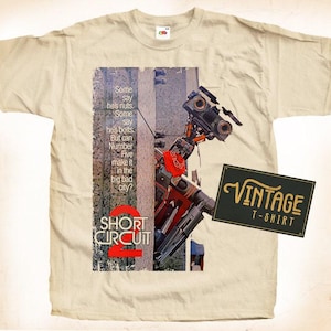 Maglietta Corto Circuito Jonny Five V2 Maglietta Cotone Vintage Naturale Poster Film Beige Tutte le Taglie S M L XL 2X 3X 4X 5X