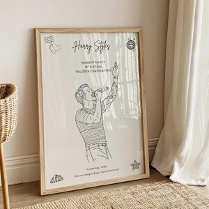 May include: A framed print featuring a black line art illustration of a singer performing. Text reads Harry Styles, Wembley Night 2, 15th June 2026, Together Together Tour, Surprise Song: Matilda, What's making you happy, that's love in the hall.