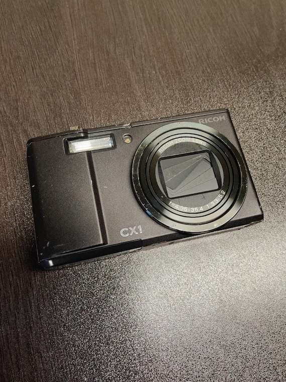 【値下げ】Ricoh CX1 Buy RICOH CX1 Black 7.1x Optical Zoom 9.3MP Digital Camera Tested