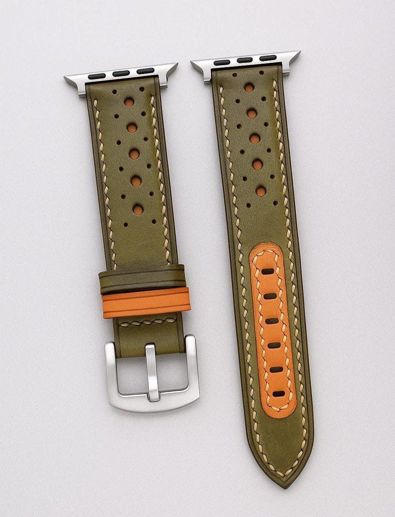 May include: Olive green leather watch band with perforated detailing and tan accents. The band features a silver buckle and is shown with a silver Apple Watch. The text "No:4" is visible in the lower left corner.