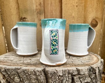 Unique Floral White & Turquoise Ceramic Pocket Hand Warming Mug - Handmade Delight for Warmth