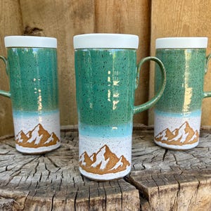 Handmade Turquoise and White Mountain Ceramic Travel Mug with Silicone Lid - Cup Holder Friendly