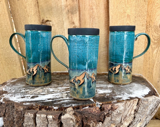 Featured listing image: Handmade Teal Mountain Ceramic Travel Mug with Silicone Lid - Cup Holder Friendly