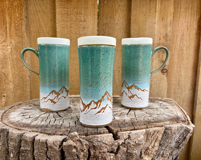 Featured listing image: Handmade Turquoise and White Mountain Ceramic Travel Mug with Silicone Lid - Cup Holder Friendly