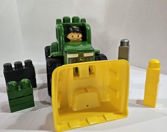 Mega Bloks John Deere Tractor transformable o camión volquete Figura de granjero 14 bloques
