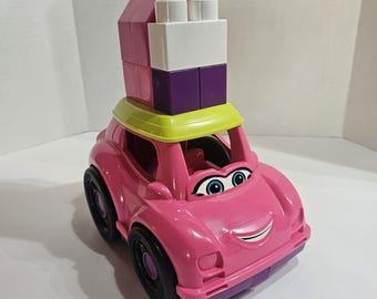 Coche MEGA BLOKS rosa Catie descapotable con 8 bloques (sin figura)