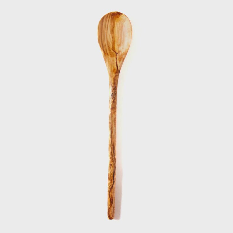 May include: A wooden spoon with a long handle and a rounded head. The spoon is made of light brown wood with darker brown grain patterns. The spoon is designed for cooking and serving.