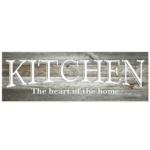 May include: A rustic wooden sign with the word "KITCHEN" in white lettering and the phrase "The heart of the home" below it.