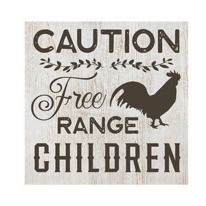 May include: A white wooden sign with black text that reads "CAUTION Free Range CHILDREN" with a black silhouette of a rooster in the middle.
