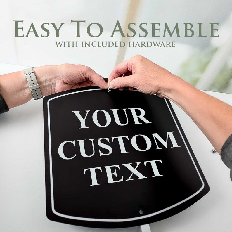 May include: A black sign with white text that reads "YOUR CUSTOM TEXT". The sign has a white border and is being assembled. The text "EASY TO ASSEMBLE" is above the sign.