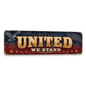 May include: A rectangular metal sign with a distressed finish featuring the text UNITED WE STAND in gold lettering. The design includes a bald eagle, a waving American flag, fireworks, and stars against a red, white, and blue background.
