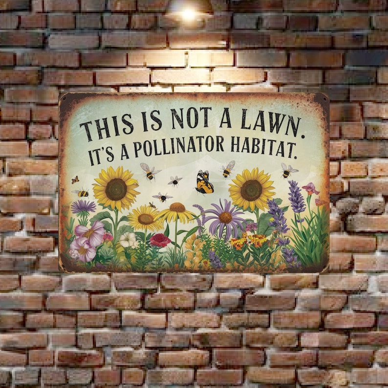May include: A metal sign with a rustic background featuring a variety of flowers and butterflies. The sign reads "This is not a lawn. It's a pollinator habitat."