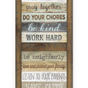May include: A rustic wooden sign with the words "House Rules" and a list of rules for family life, including "Stay Strong", "Family Comes First", "Pray Together", "Do Your Chores", "Be Kind", "Work Hard", "Be Neighborly", "Love and Protect Your Family", "Listen to Your Parents", "Have Faith", "Share Blessings", "Have Fun", and "Live Well".