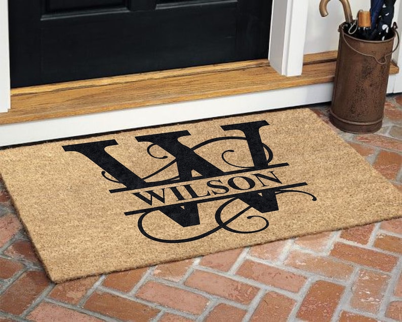 Personalized coir doormat with a custom monogram, ideal for housewarming gifts or special occasions. Made from natural coir fibers, this durable and eco-friendly mat adds a stylish and practical touch to any home entrance.