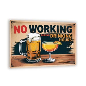May include: A rectangular metal sign with the text "NO WORKING DURING DRINKING HOURS". The sign features illustrations of a beer mug with foam and a cocktail with an orange slice, set against a vintage-style background.