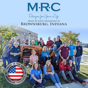 May include: Group photo of people posing with an orange Allis-Chalmers tractor. The image includes the text "M.R.C Designs for Your Life" and "Made by Your Neighbors in Brownsburg, Indiana." A "Made in the USA American Product" seal is also visible.