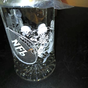 Vintage Avon 1998 NFL beer stein. In box. New. Etched glass with pewter lid.