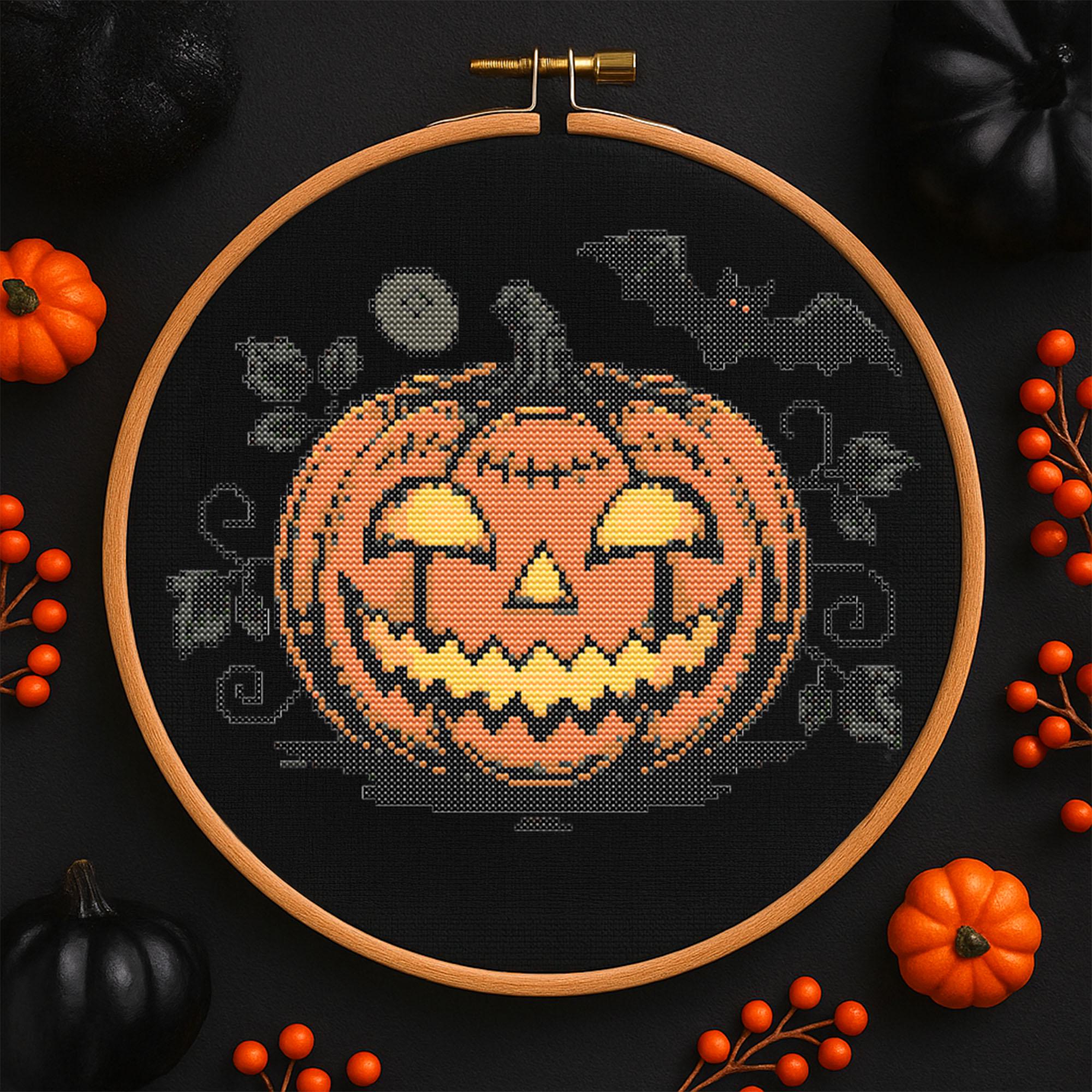 不気味なカボチャのクロスステッチパターン ハロウィンの光るカボチャ