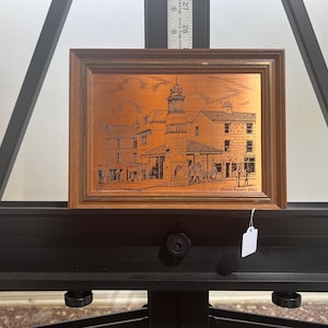 May include: A framed copper etching of a building with a clock tower. The etching is titled "Market Square, Ohio".