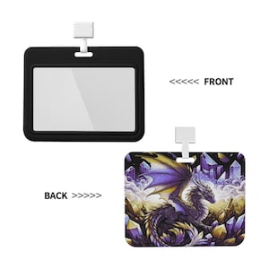 May include: Black ID badge holder with a clear window on the front. The back features a fantasy illustration of a purple and gold dragon with outstretched wings, surrounded by crystals and rocks.