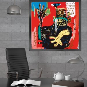 K&ouml;nnte beinhalten: Ein gerahmtes abstraktes Gem&auml;lde mit rotem Hintergrund und einer schwarzen Figur mit einer gelben Hand. Die Figur tr&auml;gt eine schwarze Maske und hat einen wei&szlig;en Strich &uuml;ber dem Gesicht. Das Gem&auml;lde hat schwarze, wei&szlig;e, gelbe, gr&uuml;ne und blaue Akzente. Der Text "(EEEE) ERNOK ERNK NA NE" steht in der oberen rechten Ecke des Gem&auml;ldes.