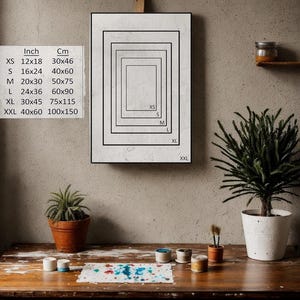 K&ouml;nnte beinhalten: Ein gerahmtes Poster mit wei&szlig;em Hintergrund und schwarzen Linien, die verschiedene Gr&ouml;&szlig;en von Rechtecken umrei&szlig;en. Das Poster zeigt die Abmessungen jedes Rechtecks in Zoll und Zentimetern. Der Text auf dem Poster lautet: "Inch Cm XS 12x18 30x46 S 16x24 40x60 M 20x30 50x75 L 24x36 60x90 XL 30x45 75x115 XXL 40x60 100x150".
